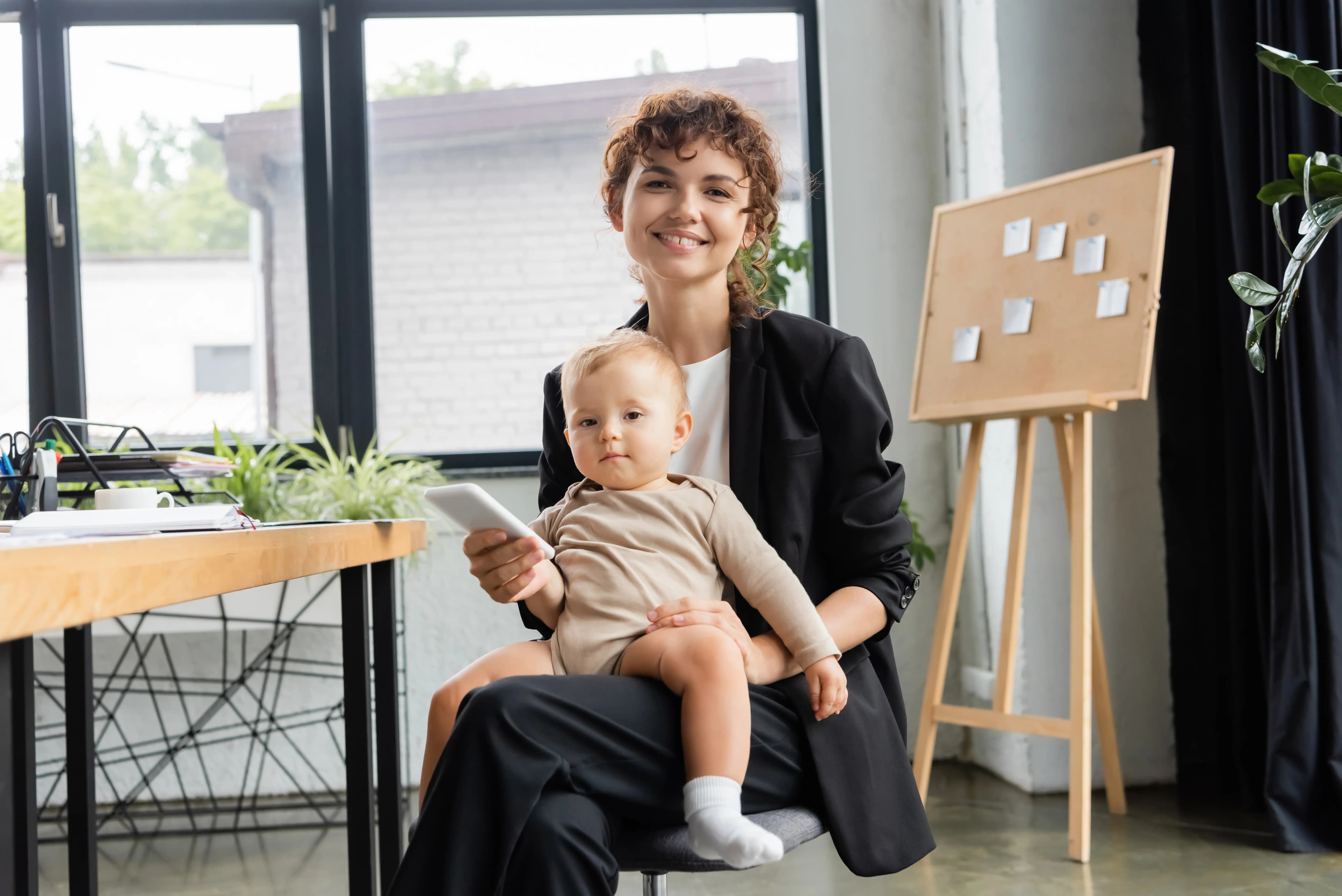 Parent working productively in a family-friendly workspace